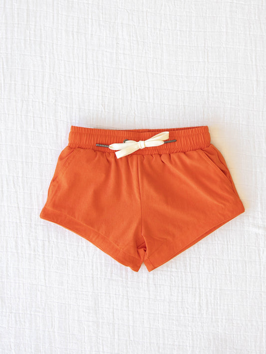 European cut style of our Boy's Everyday Lined Trunks – Orange Solid