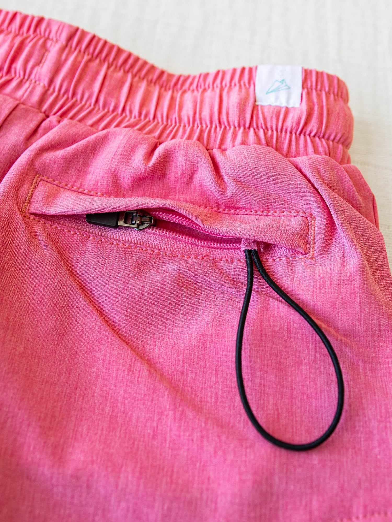 Closeup of the zippered back pocket.